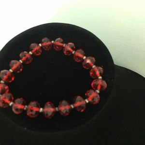 Get a free gift too ! Red bracelet